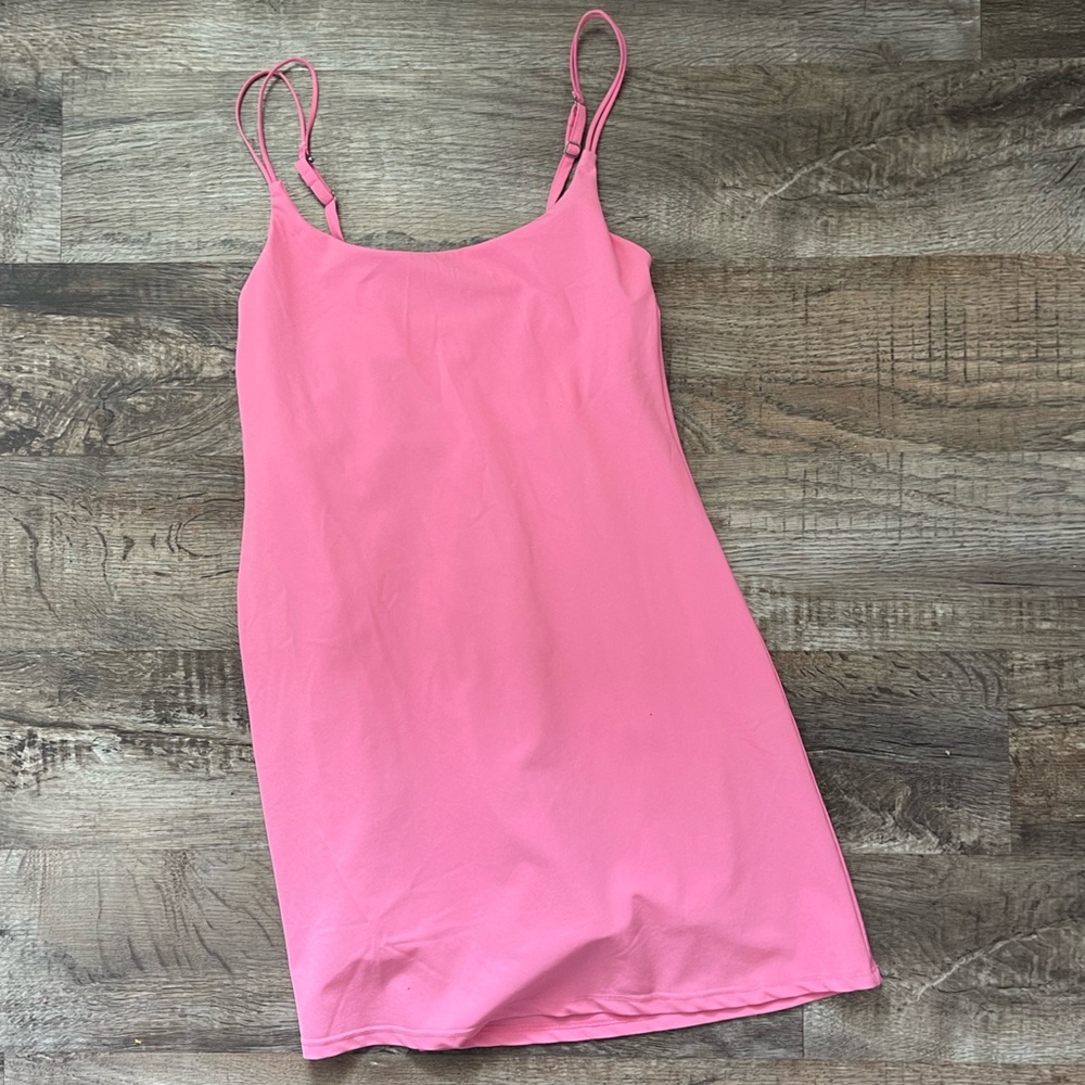 Abercrombie hot pink athleisire dress with built in shorts. Size xs.